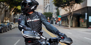 Rider out in city wearing Alpinestars Monza Jacket