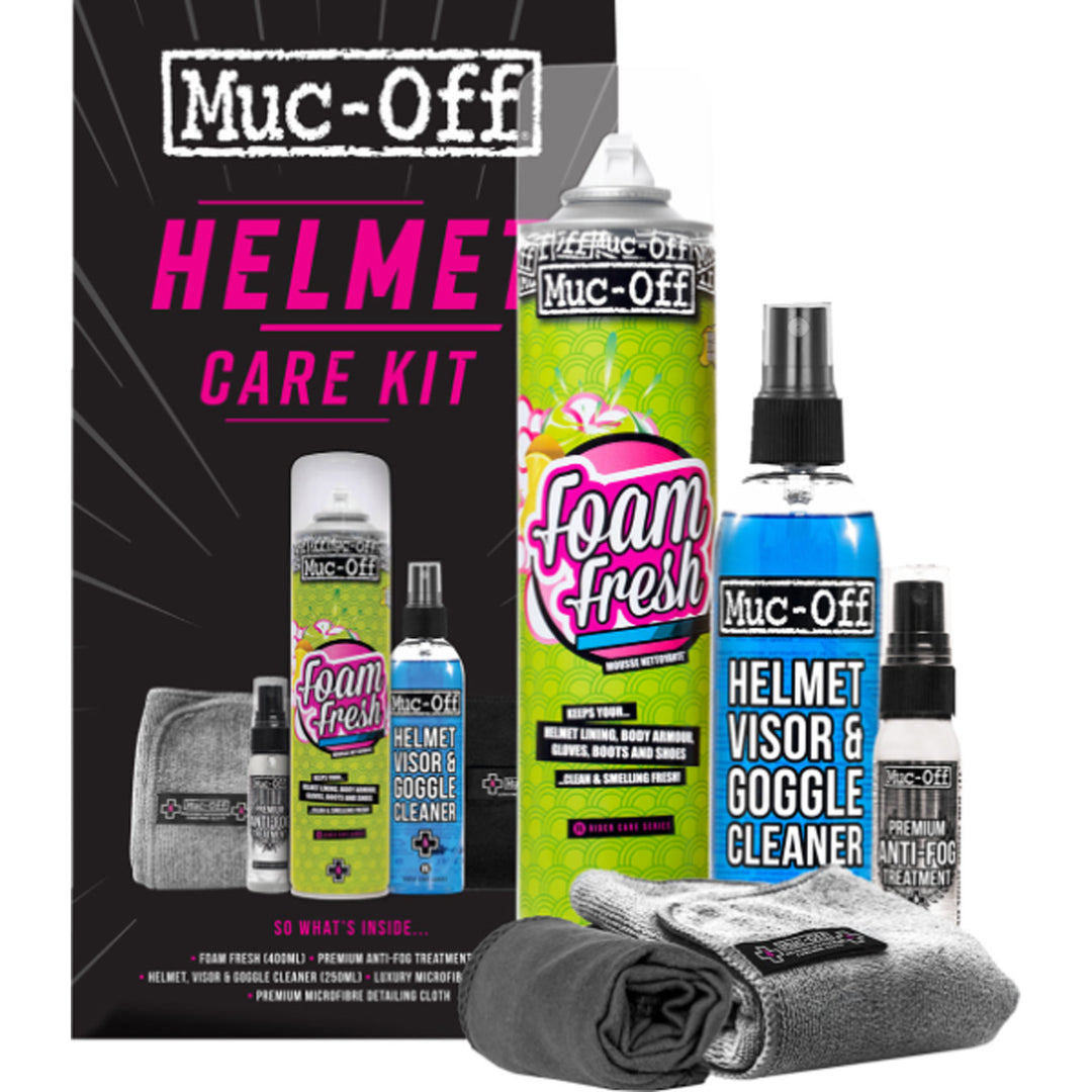 Muc-Off Helmet Care Kit - Front View of Box Case with Staged Products Beside: Foam Fresh, Helmet Visor/Goggle Cleaner, Anti-Fog Treatment, Microfiber Cloth, and Rolled-Up Storage Bag