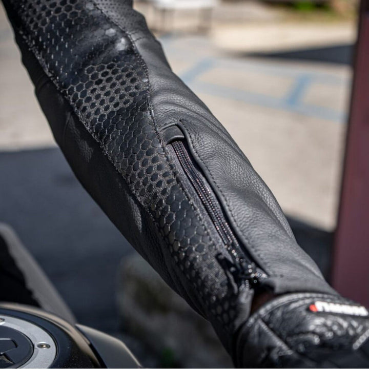 Noru Twenty-Eight 1-Piece Race Suit Black - Lifestyle Close-Up of Wrist Zipper