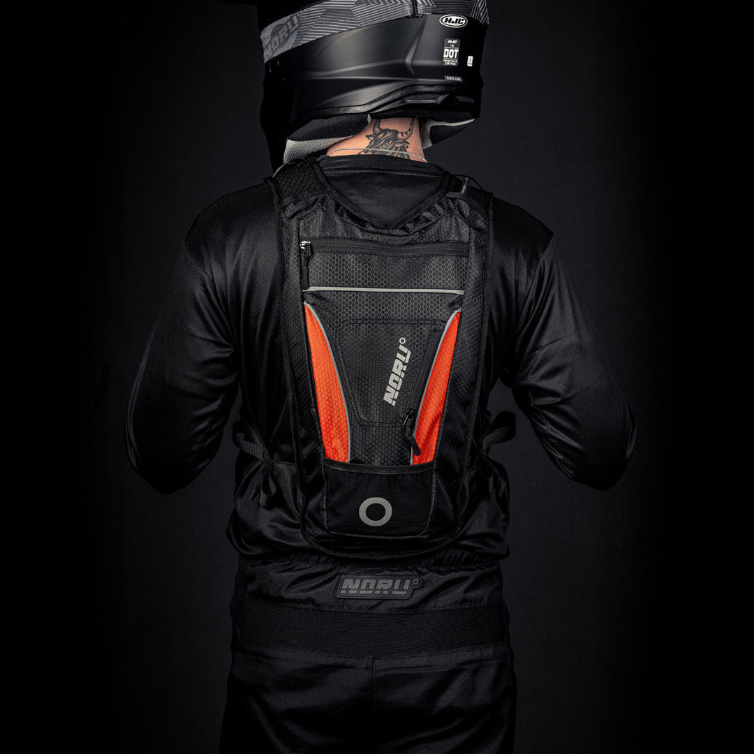 Noru Hidaka Hydropack Black/Orange - View from Back of Model Wearing Hydropack