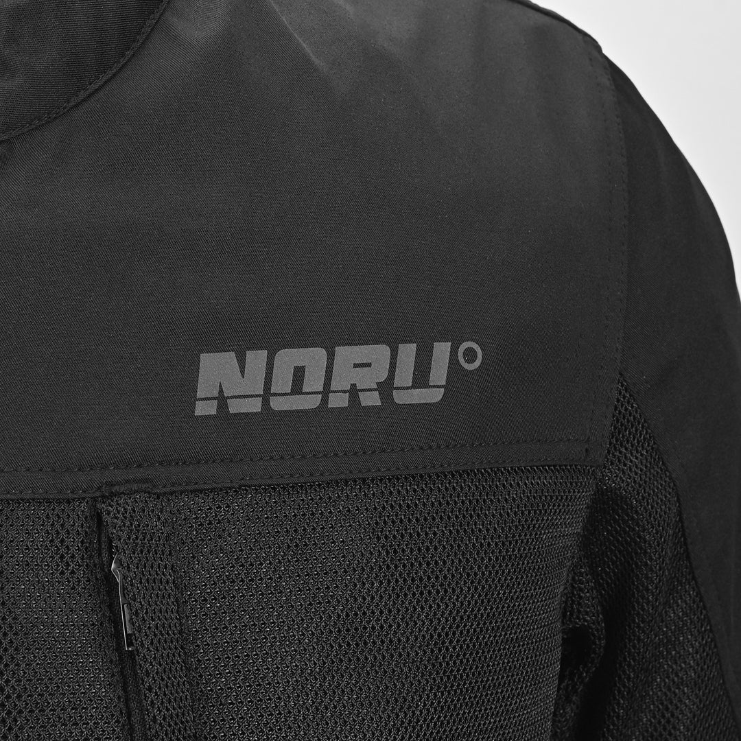 Noru Hakken Adventure Mesh Jacket Black - Close-Up of Brand Logo on Chest
