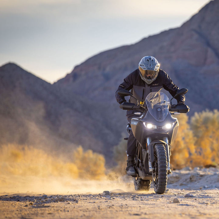 Noru Hakken Adventure Waterproof Jacket Grey - Lifestyle of Rider Wearing Jacket While Riding Grey Dual Sport Motorcycle