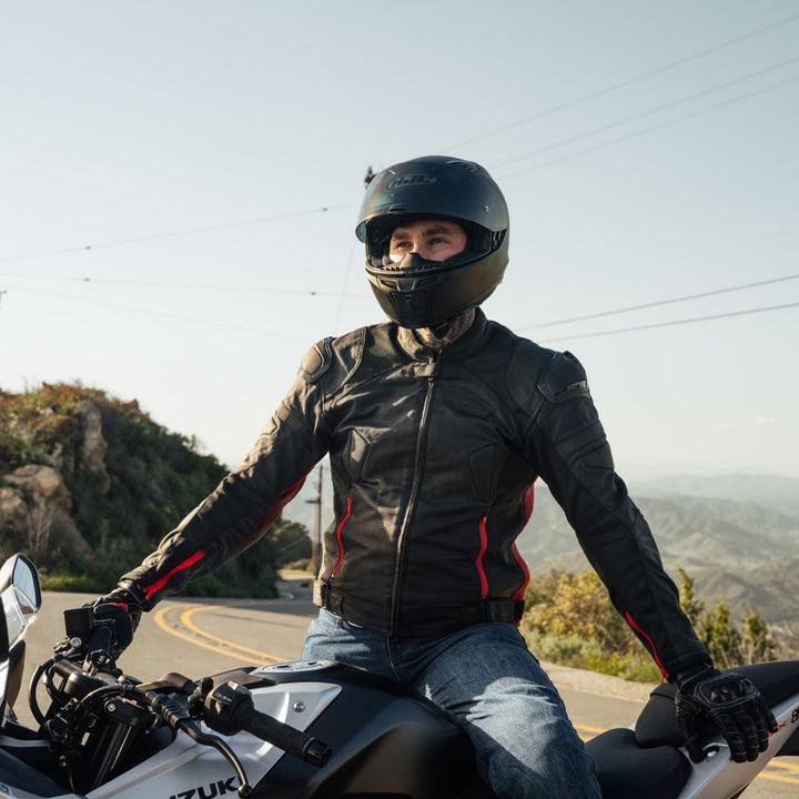 Noru Kaneda Leather Jacket Black/Red - Lifestyle Shot of Rider Wearing Jacket on Mountain Highway