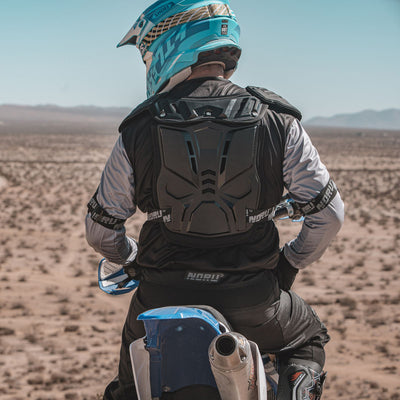 Noru Mamoru MX Roost Guard - Lifestyle Rear View of Rider Wearing Roost Guard