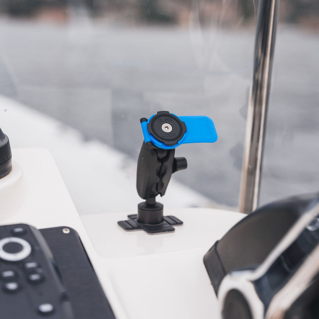 Quad Lock 360 Arm - Dual Pivot - Lifestyle Close-Up of 360 Arm Mounted on Boat Dashboard