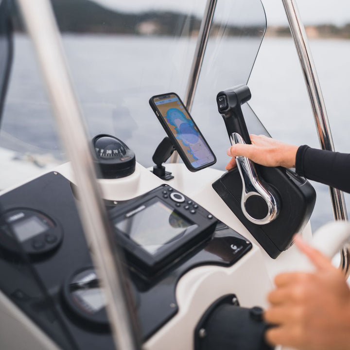 Quad Lock 360 Arm - Dual Pivot - Lifestyle of 360 Arm Mounted on Boat Dashboard