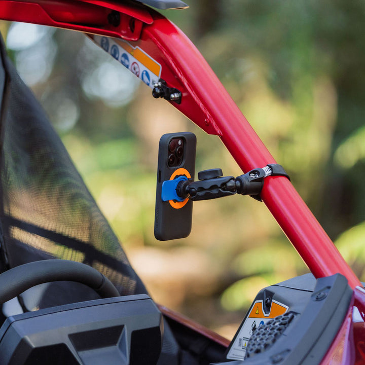 Quad Lock 360 Base - Hose Clamp - Lifestyle of Hose Clamp Installed on Red UTV Side Bar