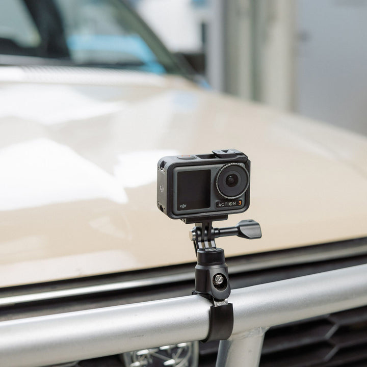 Quad Lock 360 Base - Hose Clamp - Lifestyle of Hose Clamp Installed on Front Bar of White Truck