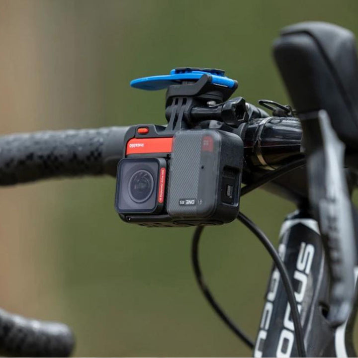 Quad Lock Action Cam Adaptor for Out Front Mount - Lifestyle Close-Up of Cam Adaptor Installed on Bicycle Handlebar