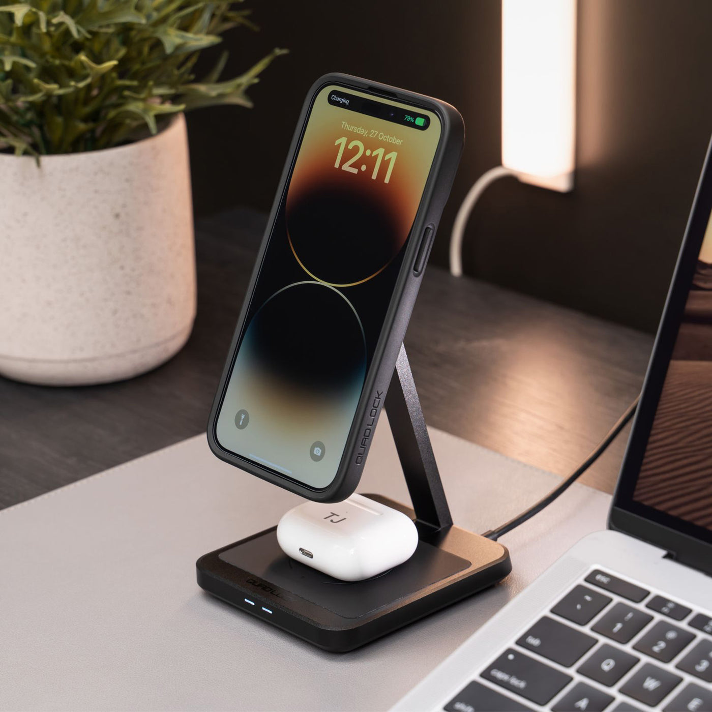 Quad Lock MAG Dual Desktop Wireless Charger - Lifestyle Shot of charger set up on desk with phone attached