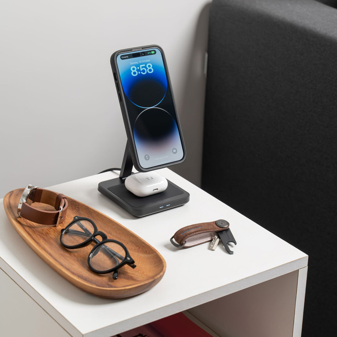 Quad Lock MAG Dual Desktop Wireless Charger - Lifestyle Shot of charger on nightstand with phone attached