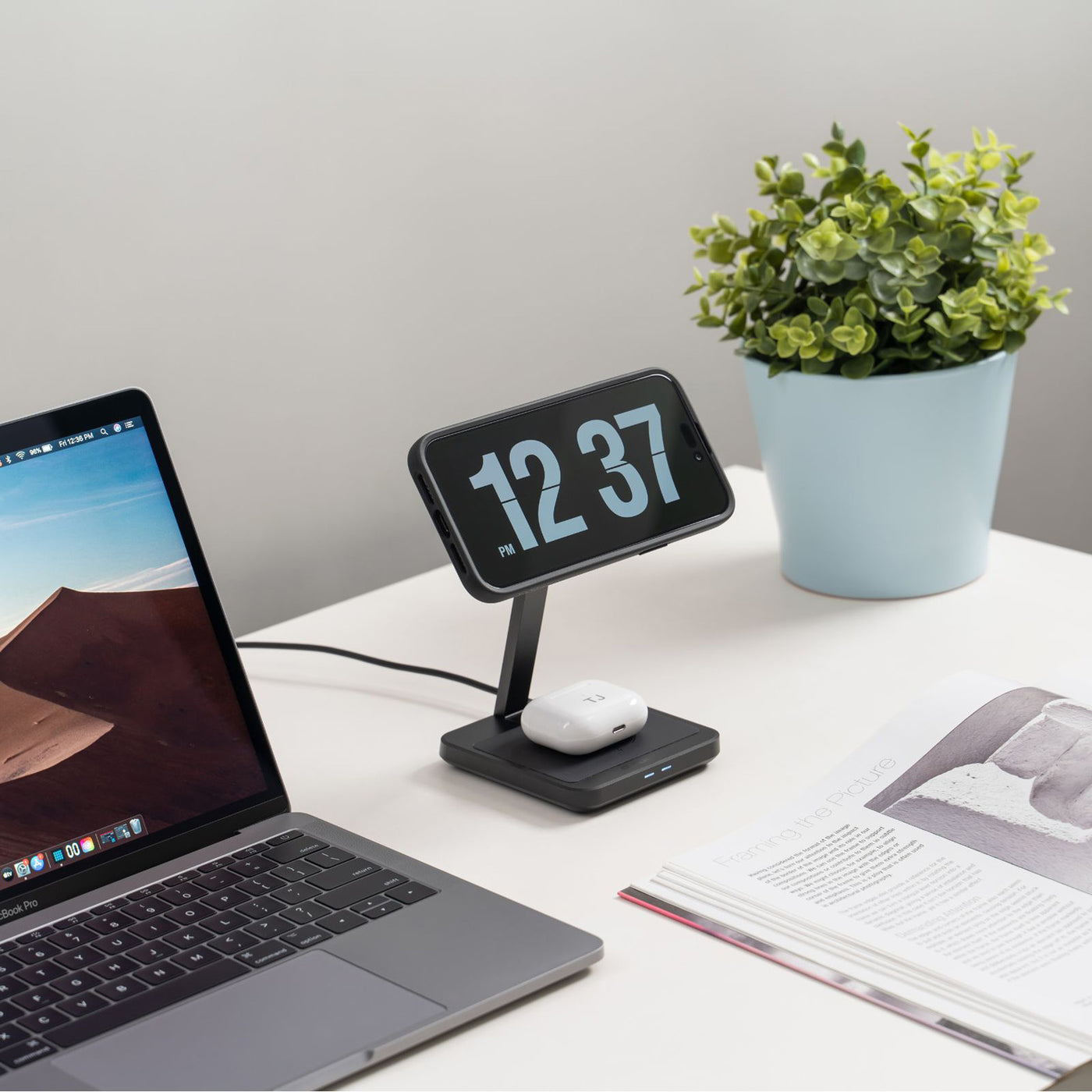 Quad Lock MAG Dual Desktop Wireless Charger - Lifestyle Shot of charger on desk next to laptop