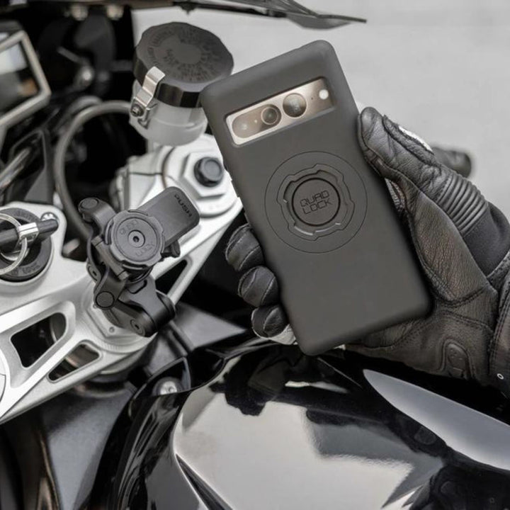 Quad Lock Phone Case - Google Pixel 8 Series - Lifestyle of Rider Lining Up Phone Case with Mount Head Lever