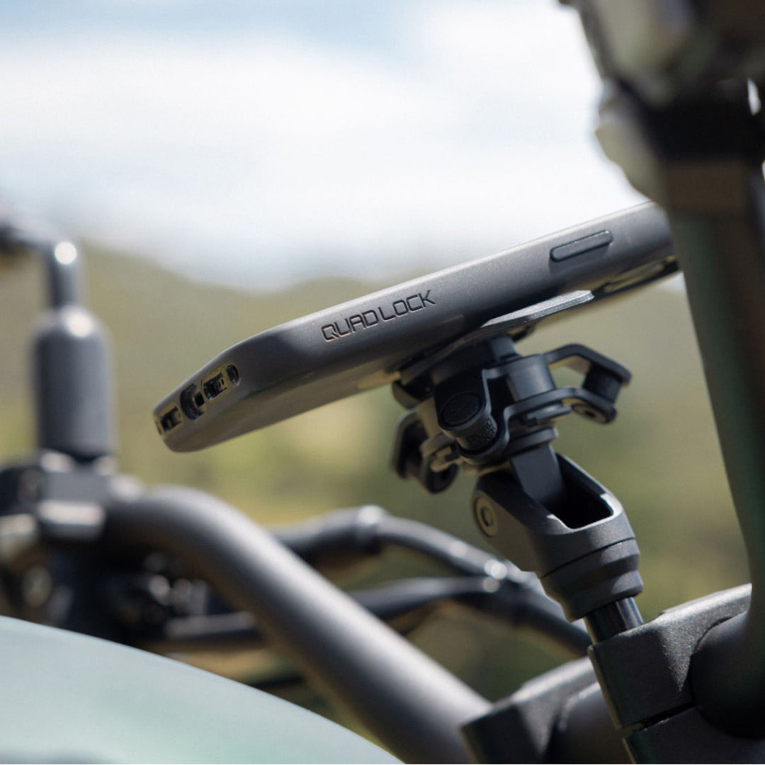 Quad Lock Motorcycle Handlebar Clamp Mount Pro - Lifestyle Close-Up of Mount Installed in Handlebar Clamp