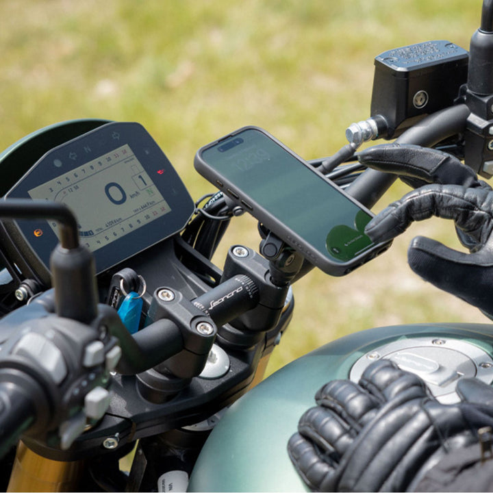 Quad Lock Motorcycle Handlebar Clamp Mount Pro - Lifestyle of Rider Using Phone Help Up by Mount