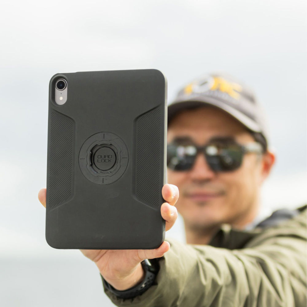 Quad Lock iPad Case - iPad Mini 6 MAG - Lifestyle Close-Up of Model Holding iPad up to Camera