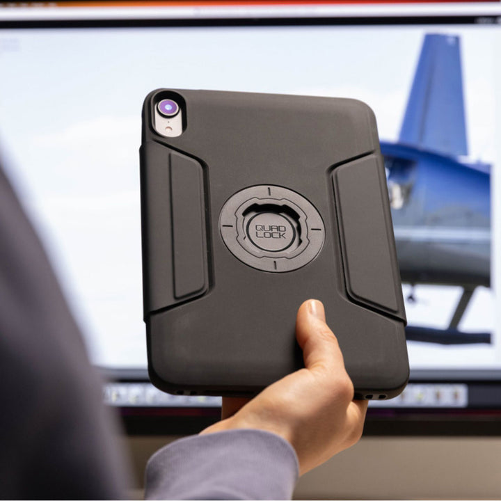 Quad Lock iPad Folio - iPad Mini 6 Original - Lifestyle of Used Holding Up iPad