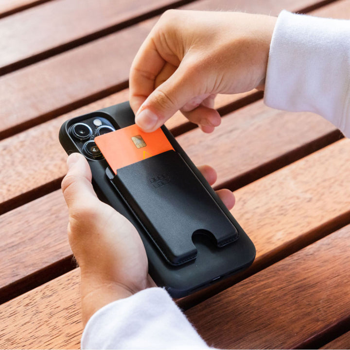 Quad Lock MAG Wallet - Lifestyle of Used Pulling Card out of Wallet