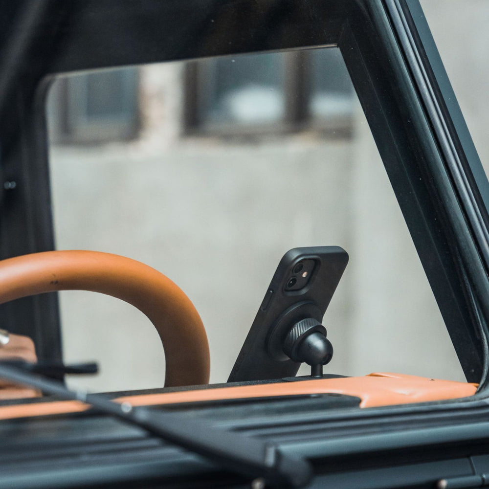 Quad Lock MAG Wireless Charging Head - V2 - Lifestyle of Charging Head Installed on Dash Mount