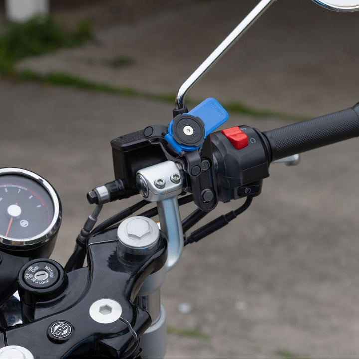 Quad Lock Motorcycle Clutch Mount - Lifestyle of Mount Installed on Grip Assembly
