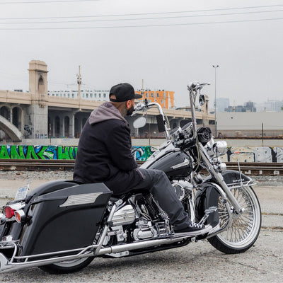 Quad Lock Motorcycle Handlebar Mount Pro - Lifestyle shot of rider on motorcycle with handlebar mount