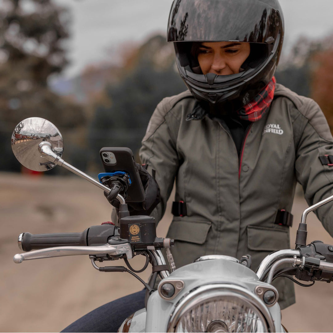 Quad Lock Motorcycle/Scooter Mirror Mount (V2) - Lifestyle of Rider Using Phone Held Up by Mount