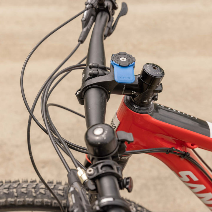 Quad Lock Out Front Mount - Lifestyle Close-Up of Mount Installed on Bicycle Handlebar