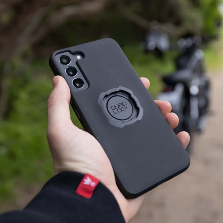 Quad Lock Phone Case - Samsung Galaxy S25 Series - Lifestyle Close-Up of Model Holding Phone with Case