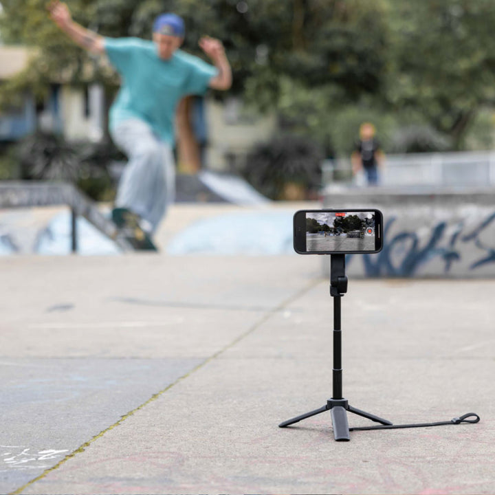 Quad Lock Tripod/Selfie Stick - Lifestyle of Phone on Extended Tripod to Record Skateboarder