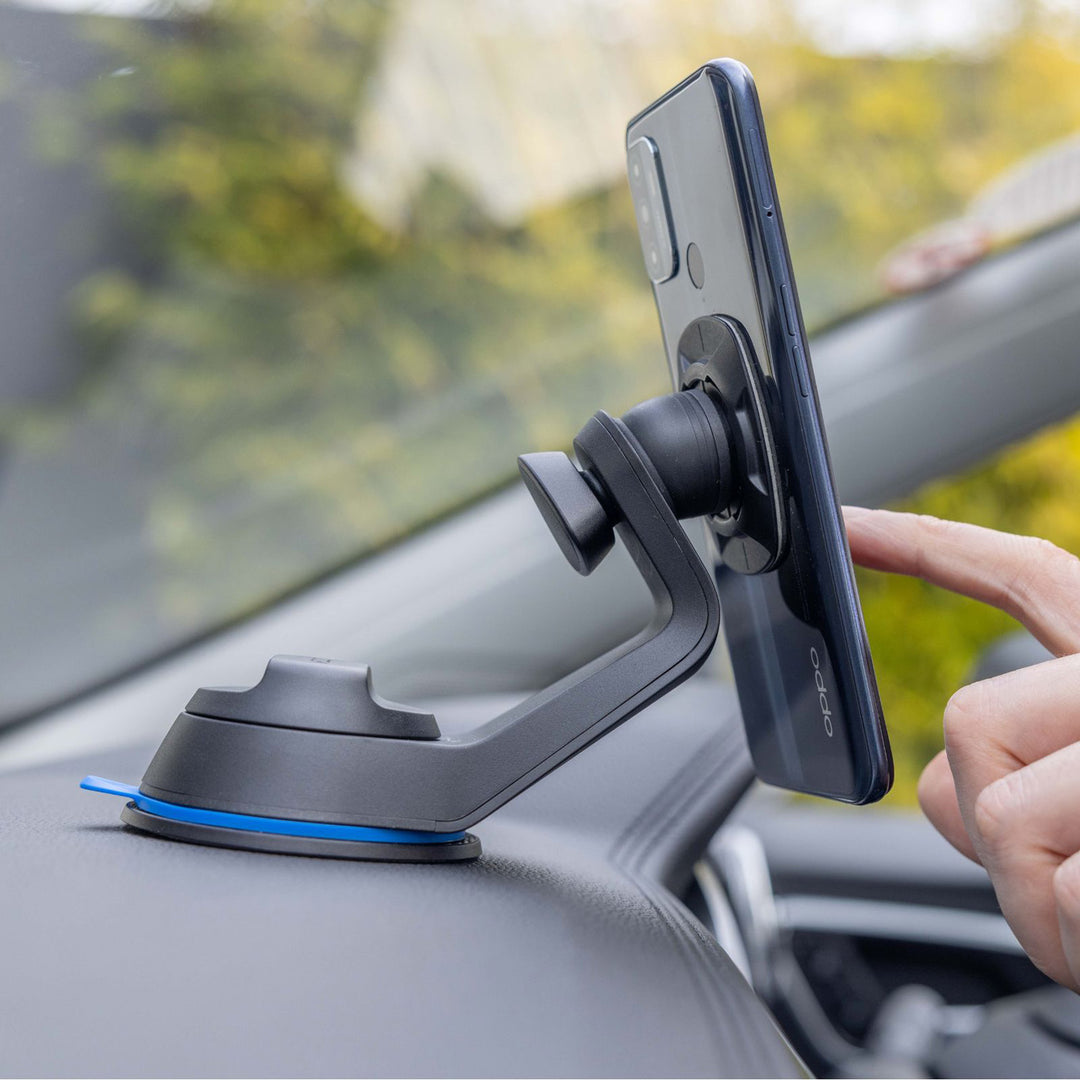 Quad Lock Universal Adaptor Original - Lifestyle Close-Up of Phone on Dashboard Mount