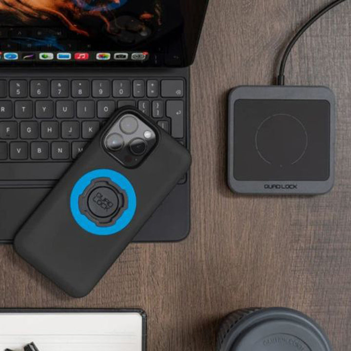 Quad Lock Wireless Charging Pad - Lifestyle of Charging Pad Next to Laptop and Phone