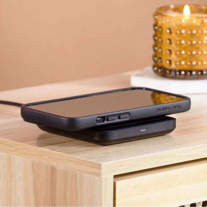 Quad Lock Wireless Charging Pad - Lifestyle of Phone on Charging Pad