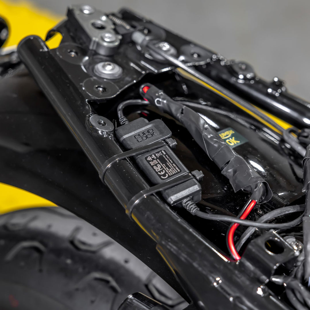 Quad Lock Waterproof 12V to USB Smart Adaptor - Lifestyle of Smart Adaptor Zip-Tied to Seat Frame