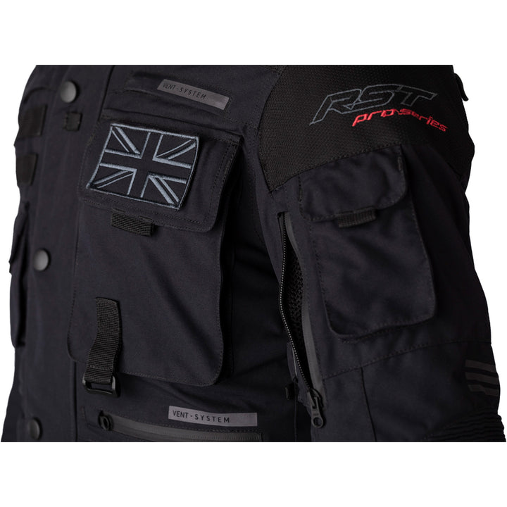 RST Pro Series Ambush CE Jacket Black/Black - Close-Up Side View of Front Chest Pocket and Open Arm Vent