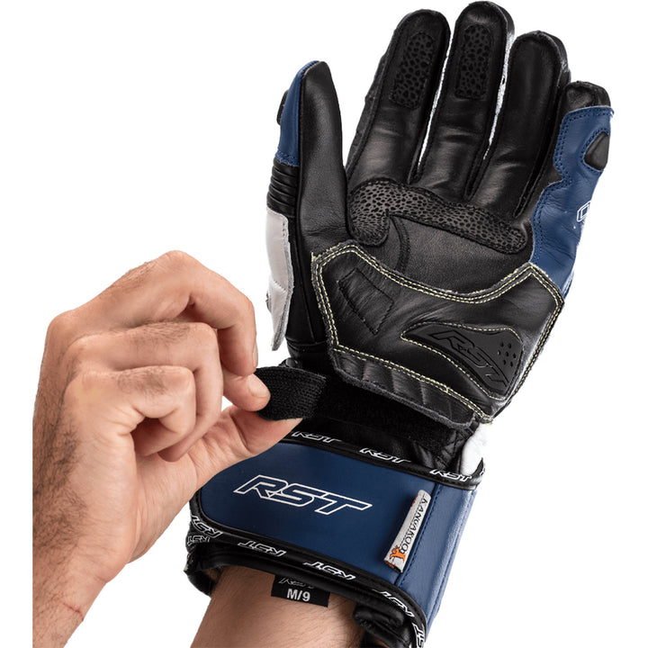 RST Tractech Evo 4 CE Gloves Blue/White/Black - Palm View of Model Adjusting Wrist Strap