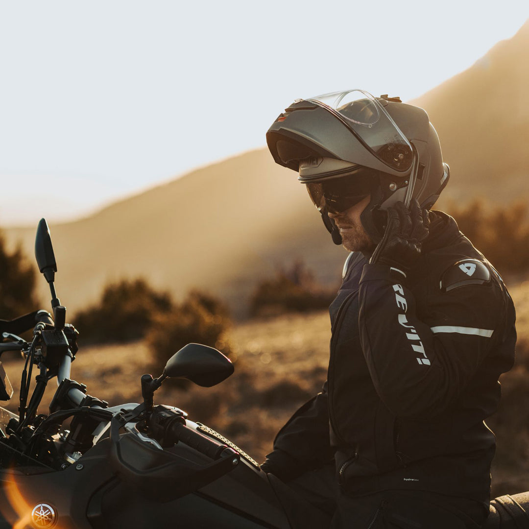 Shoei Neotec 3 Solid Helmet Anthracite Metallic - Lifestyle shot of rider wearing helmet with Modular Front raised