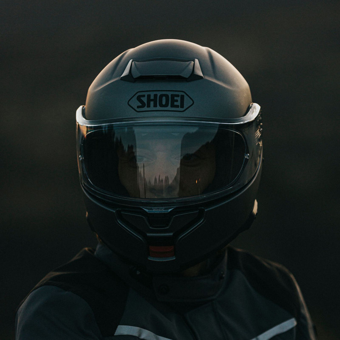 Shoei Neotec 3 Solid Helmet Anthracite Metallic - Lifestyle close-up head-on shot of rider wearing helmet
