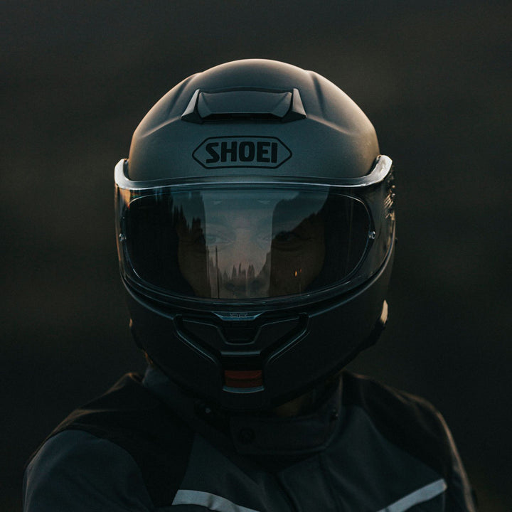 Shoei Neotec 3 Solid Helmet Anthracite Metallic - Lifestyle close-up head-on shot of rider wearing helmet