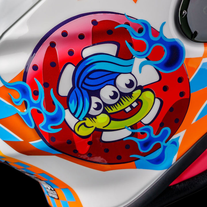 Shoei RF-1400 Yagyo Helmet TC-2 - Close-Up of Three-Eyed Character in Red Rim on Right Side