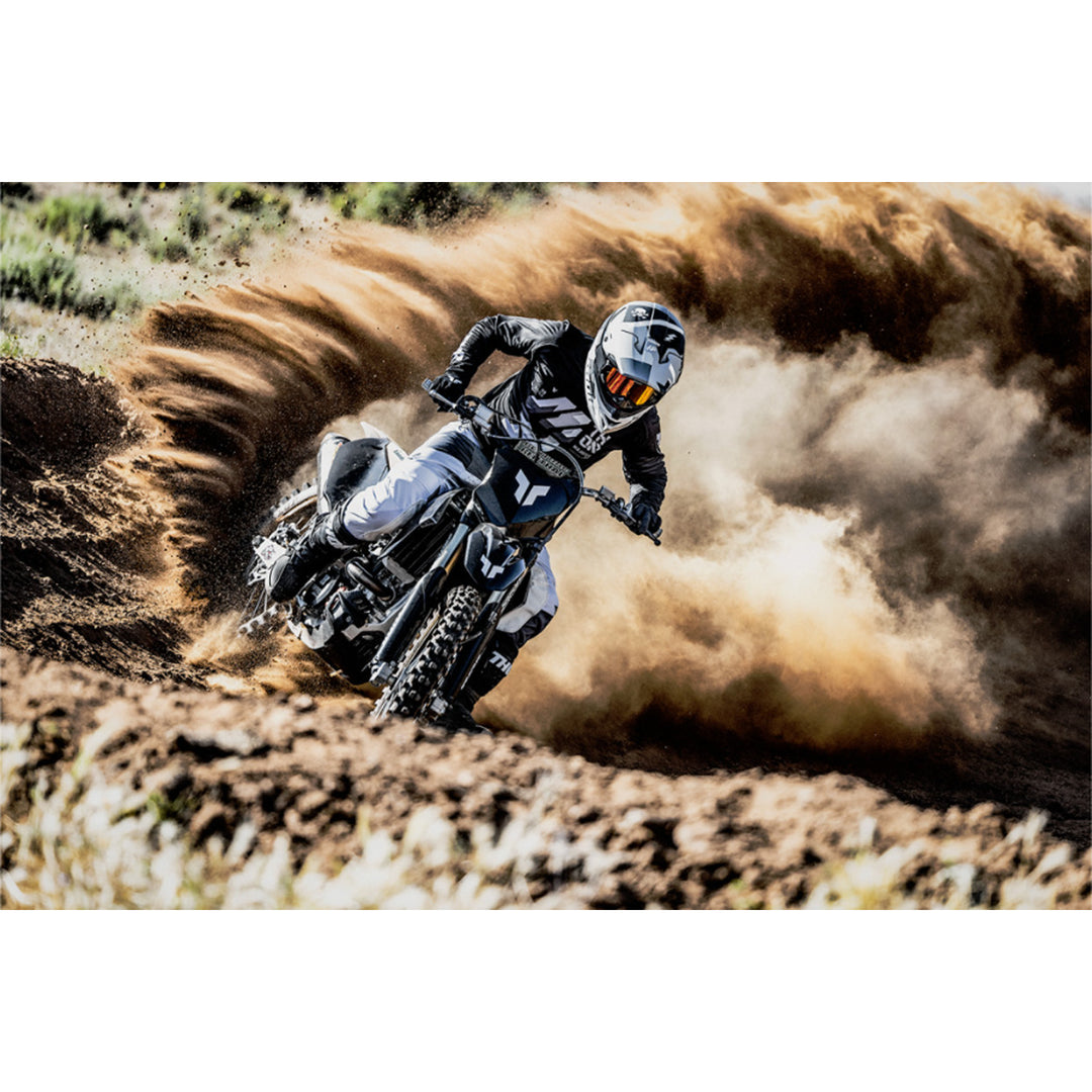THOR LAUNCHMODE Brave Jersey Black/Gray - Lifestyle of Rider in Jersey Kicking Up Dust Cloud