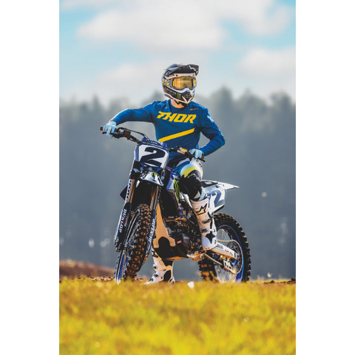 THOR SPORTMODE Brave Jersey Blue - Lifestyle of Rider Wearing Jersey on White Dirt Bike
