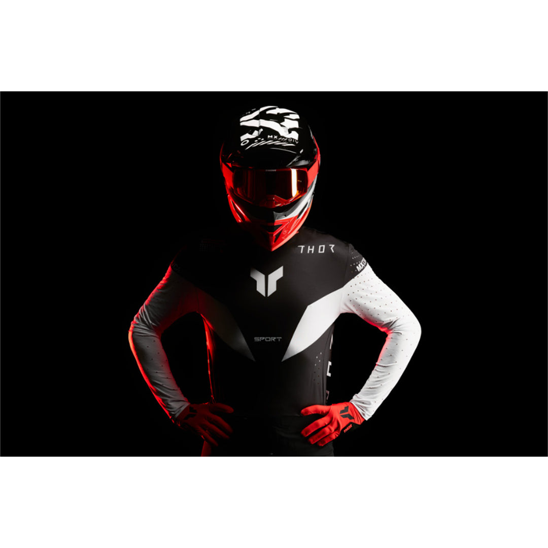 THOR SPORTMODE Strike Jersey Black - Stylized Studio Shot of Model Wearing Jersey