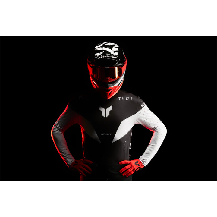 THOR SPORTMODE Strike Jersey Black - Stylized Studio Shot of Model Wearing Jersey