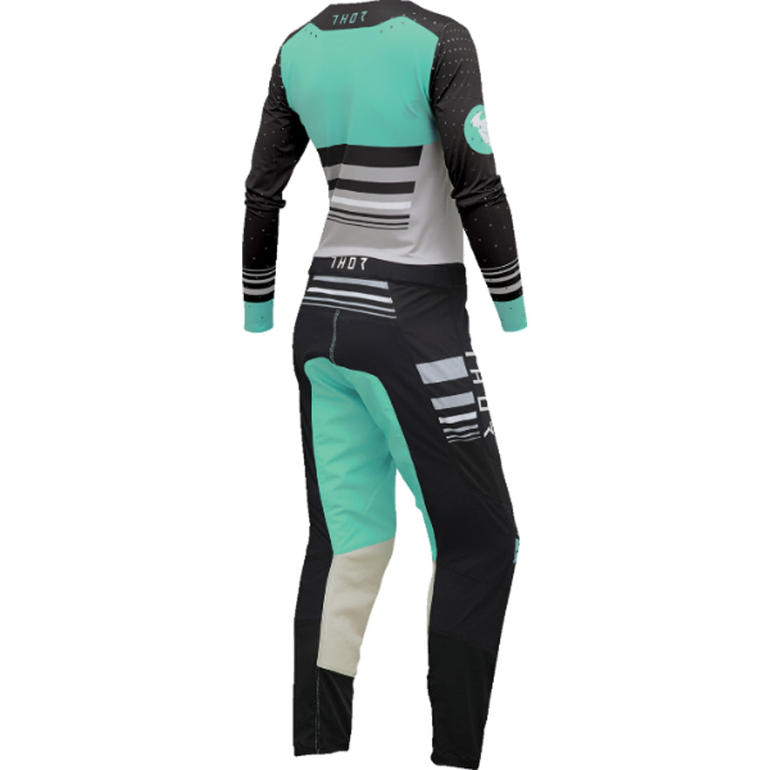 THOR Women's Prime Blaze Jersey Black/Mint - Rear View with Pants