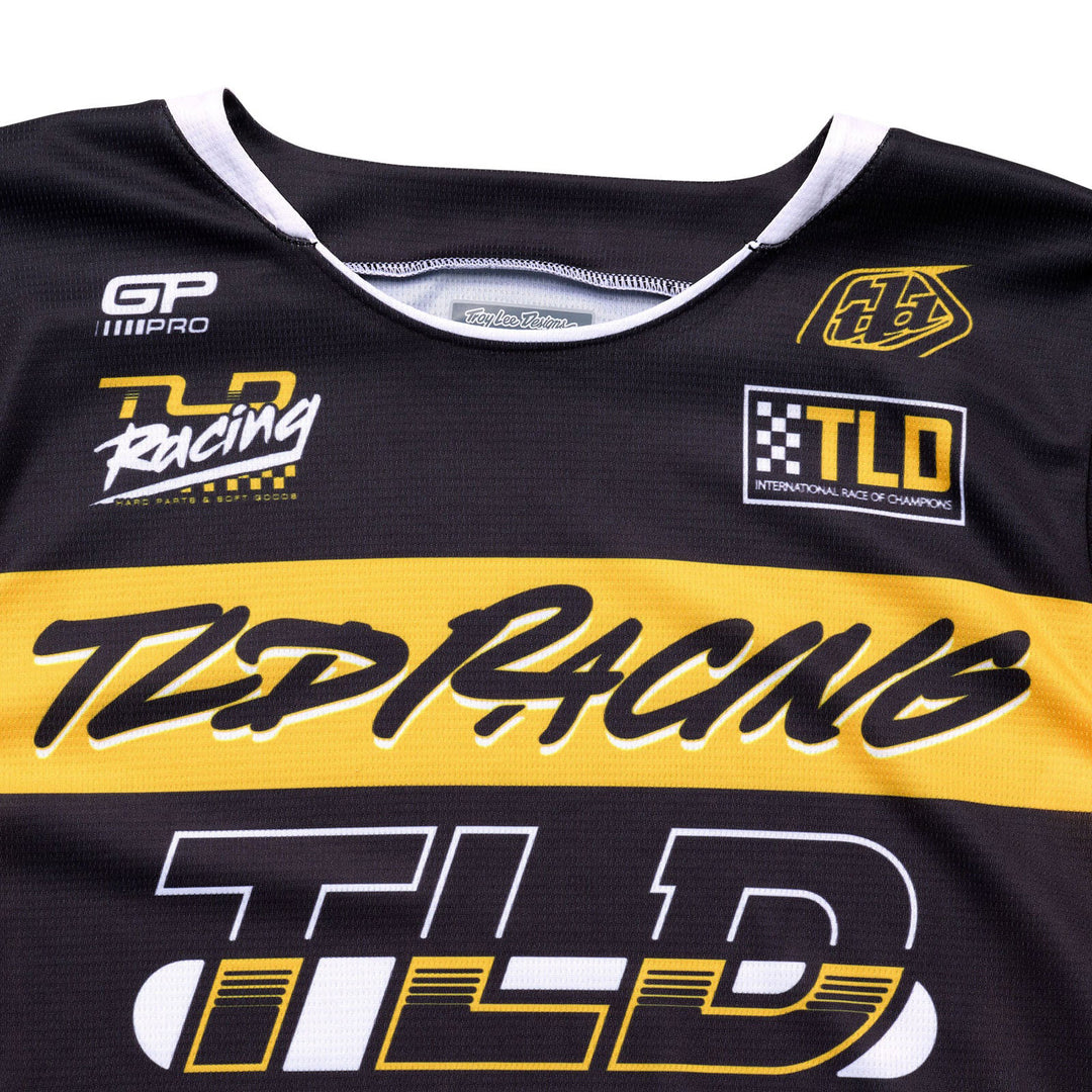 Troy Lee Designs GP Pro Fifty-50 Jersey Black/Gold - Close-Up of Front Graphics