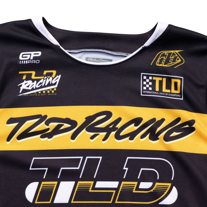 Troy Lee Designs GP Pro Fifty-50 Jersey Black/Gold - Close-Up of Front Graphics