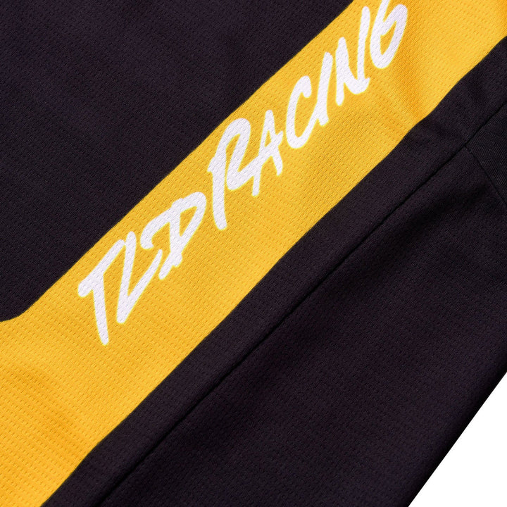 Troy Lee Designs GP Pro Fifty-50 Jersey Black/Gold - Close-Up of Left Sleeve TLD Racing Graphic