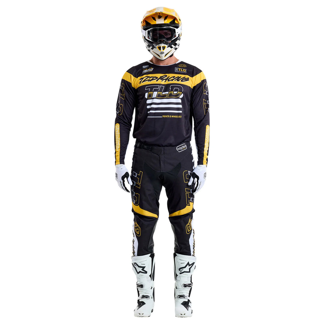 Troy Lee Designs GP Pro Fifty-50 Pants Black/Gold - Full Front View of Model Wearing Pants