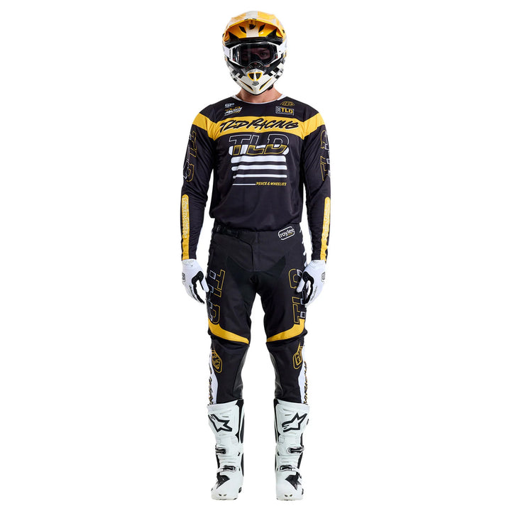 Troy Lee Designs GP Pro Fifty-50 Pants Black/Gold - Full Front View of Model Wearing Pants