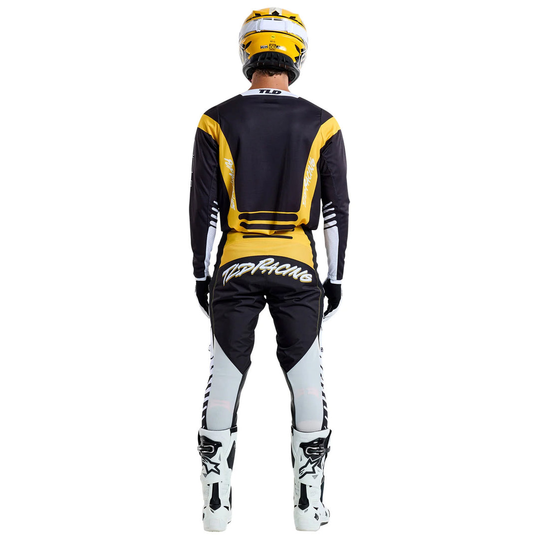 Troy Lee Designs GP Pro Fifty-50 Pants Black/Gold - Full Rear View of Model Wearing Pants